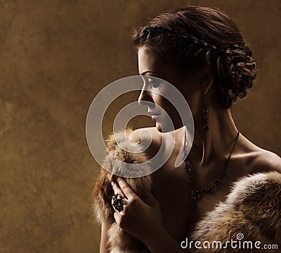 Woman in luxury fur coat, retro vintage style