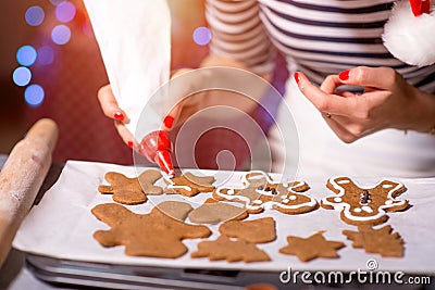 Woman making ginger cookies on Christmas