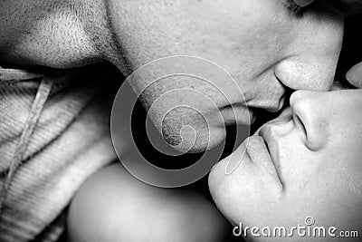 Woman and man kissing