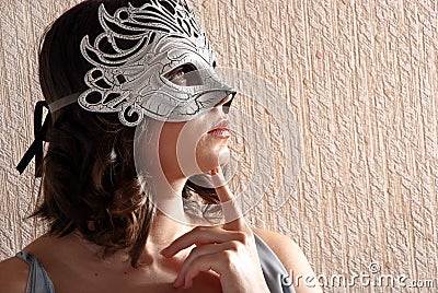 Woman in masquerade mask