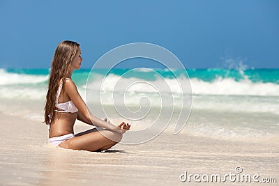 Woman Meditation At Tropical Beach