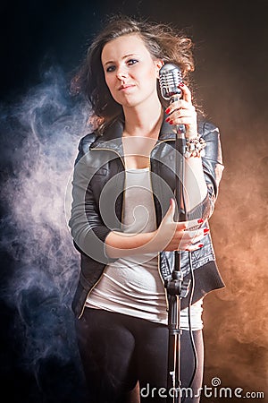 Woman with microphone on the stage