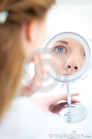 Woman with mirror