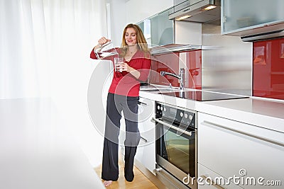 Woman in modern kitchen