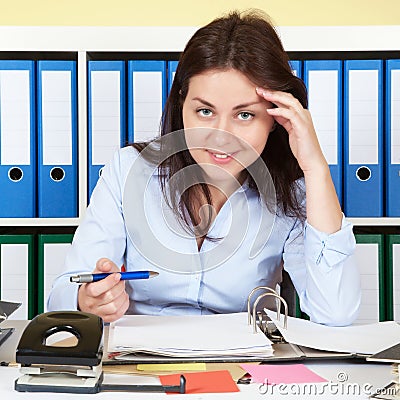 Woman at office laughing at camera