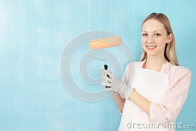 Woman with paint roller