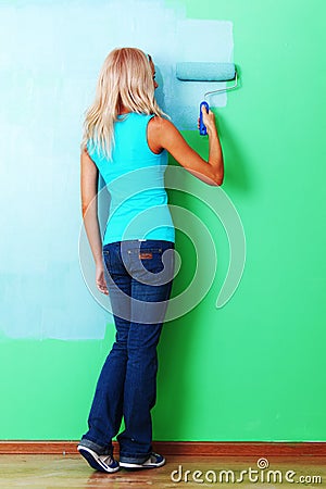 Woman paint on wall