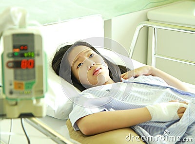 Woman patient in hospital bed