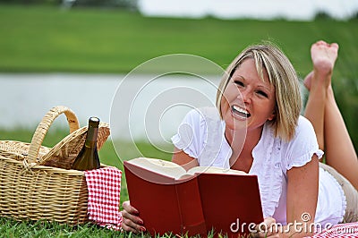 Woman on Picnic with Book and Wine