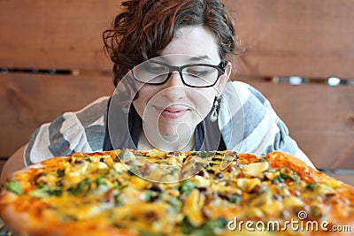 Woman with pizza