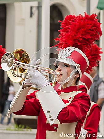 A woman playing trumpet