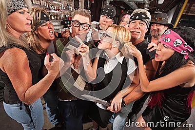 Woman Pointing at Thugs in Bar