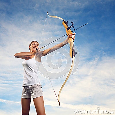 Woman practicing with bow and arrow