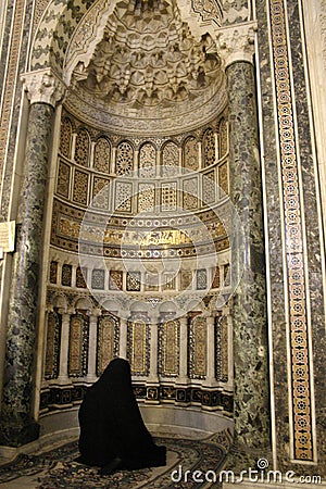 Woman Praying in Mosque