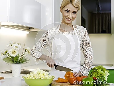 Woman preparing vegetarian salad