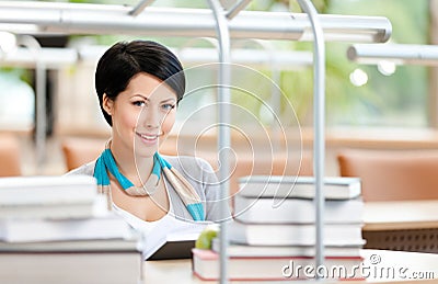 Woman reads at the library