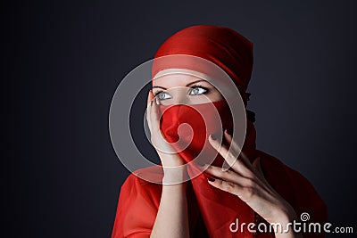 Woman in red veil photo