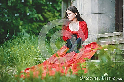 Woman in red Victorian dress