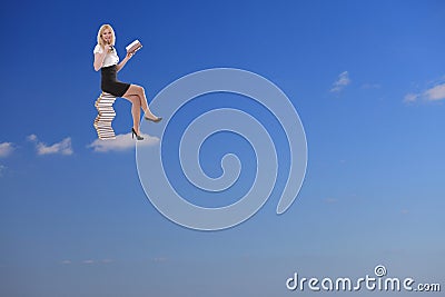 Woman Relax and reading book on the cloud