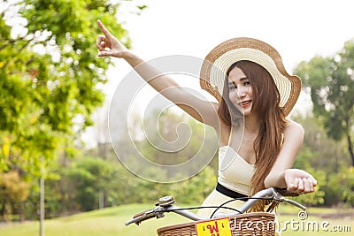 Woman relaxing in the park during the holidays.