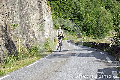 Woman riding on bicycle