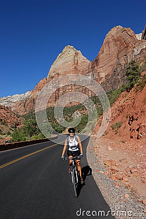 Woman road biking