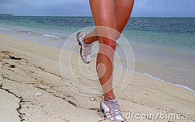 Woman Running On Beach With Sea Shoreline Background Stock Image 
