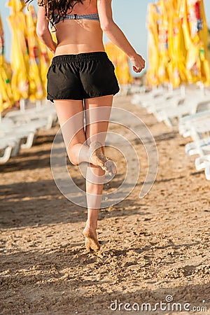 Woman running on beach