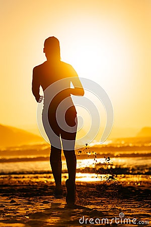 Woman running and sun