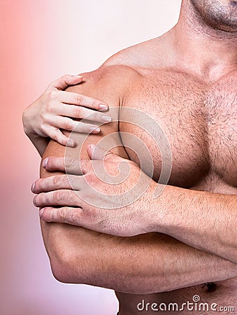 Woman s hands on a sexy man s torso