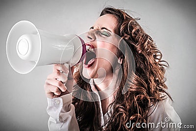 Woman screaming through a megaphone