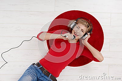 Woman singing with headset