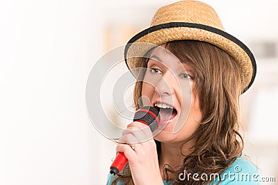 Woman singing with a microphone