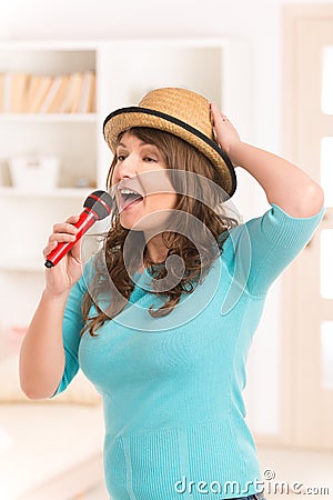 Woman singing with a microphone