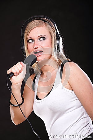 Woman singing rock song microphone