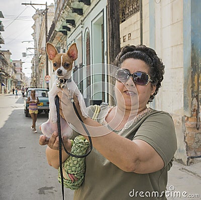 Woman and Small Dog in Havana, Cuba
