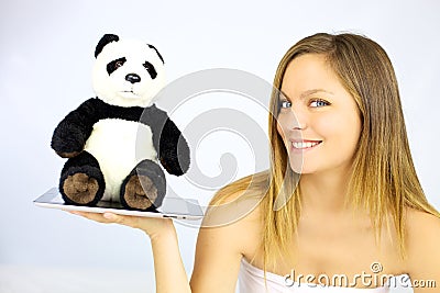 Woman smiling with panda plush