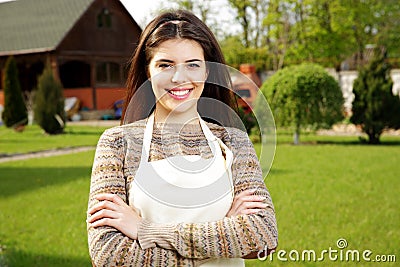 Woman standing with arms folded