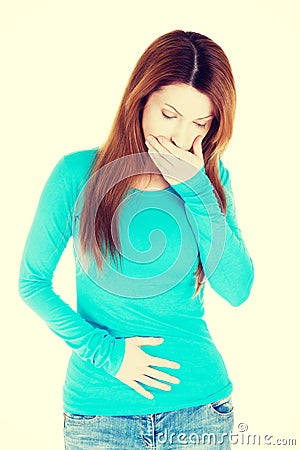 Woman with strong pain of stomach and nausea