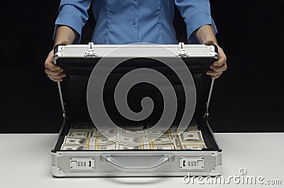 Woman With Suitcase Full Of Dollars