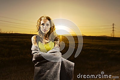 Woman at Sunset with Blanket