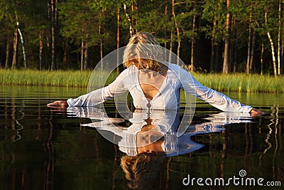 Woman swimming in lake