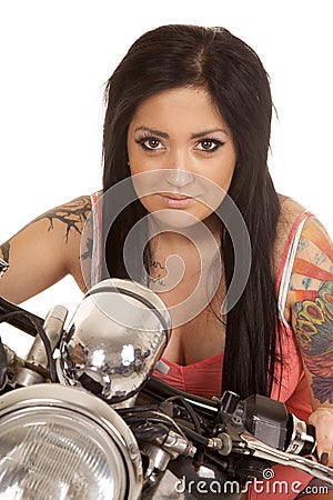 Woman tattoo pink shirt motorcycle close