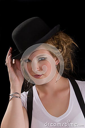 Woman in tee shirt and black hat