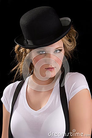 Woman in tee shirt and black hat