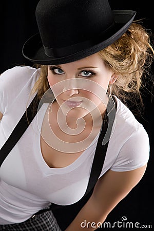 Woman in tee shirt and black hat