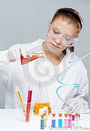 Woman with test tubes in a chemistry