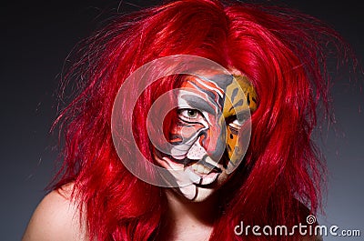 Woman with tiger face