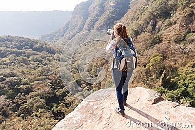 Woman top mountain