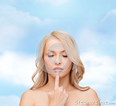 Woman touching her lips